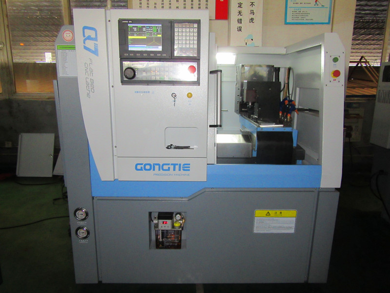 GONGTIE CNC : Q7-2A CNC WITH GANTRY LOADER